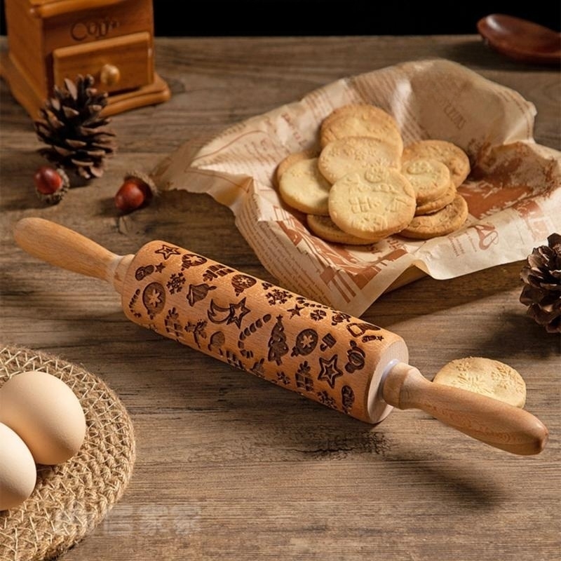 a rolling pin and biscuits