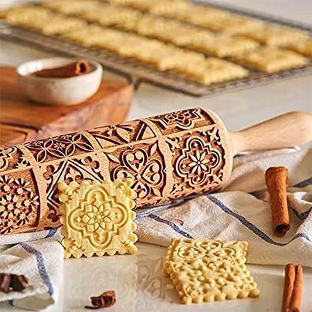 embossed rolling pin and biscuits